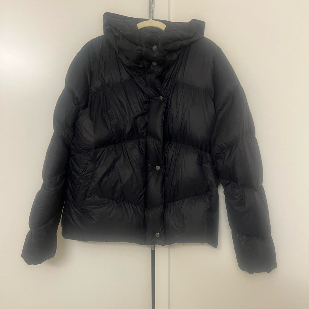 Cotopaxi cute jacket. Really warm coat but very lightweight. Stylish cut
